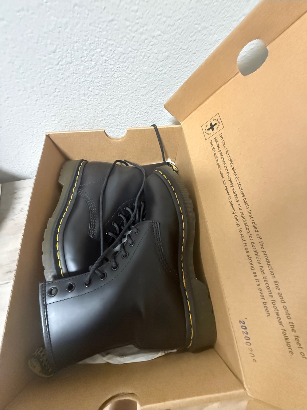 Dr. Martens Smooth Black Leather 8-Eye Lace-Up Ankle Boots with Yellow Stitching